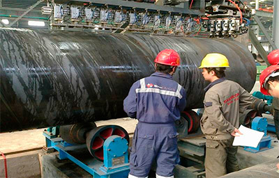 piling pipe being inspected